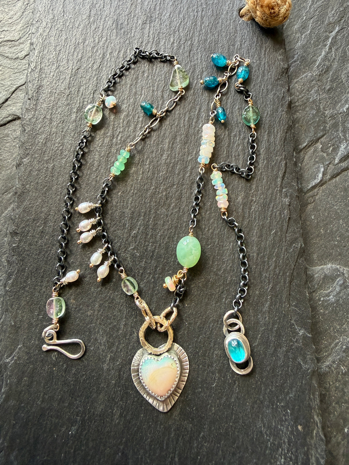 Wire wrapped gemstones with a Boulder Opal Heart