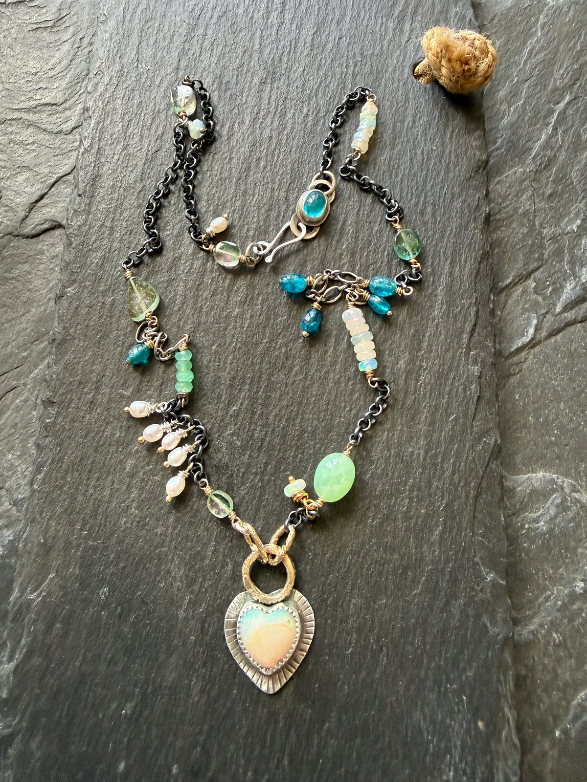 Wire wrapped gemstones with a Boulder Opal Heart