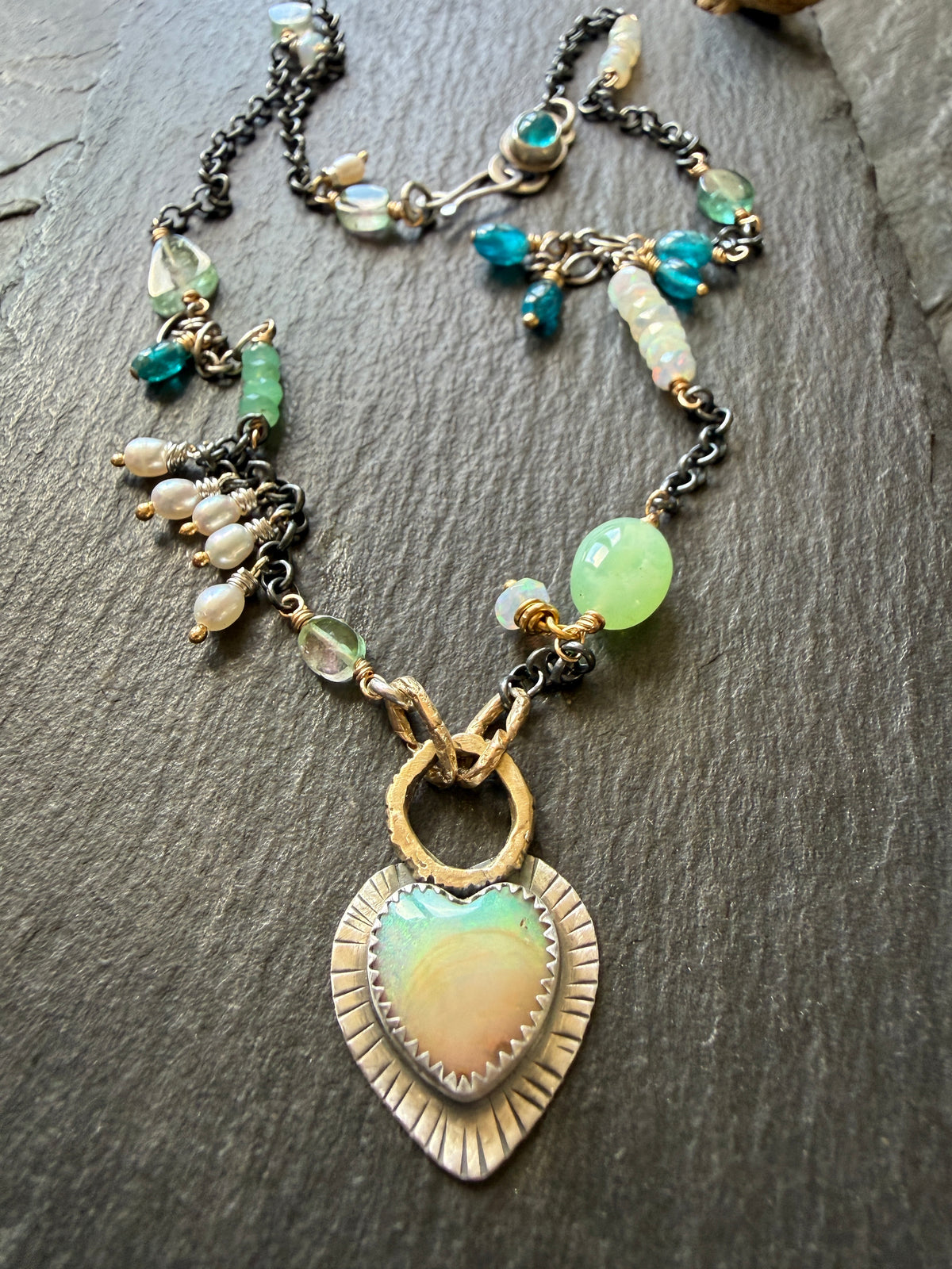 Wire wrapped gemstones with a Boulder Opal Heart