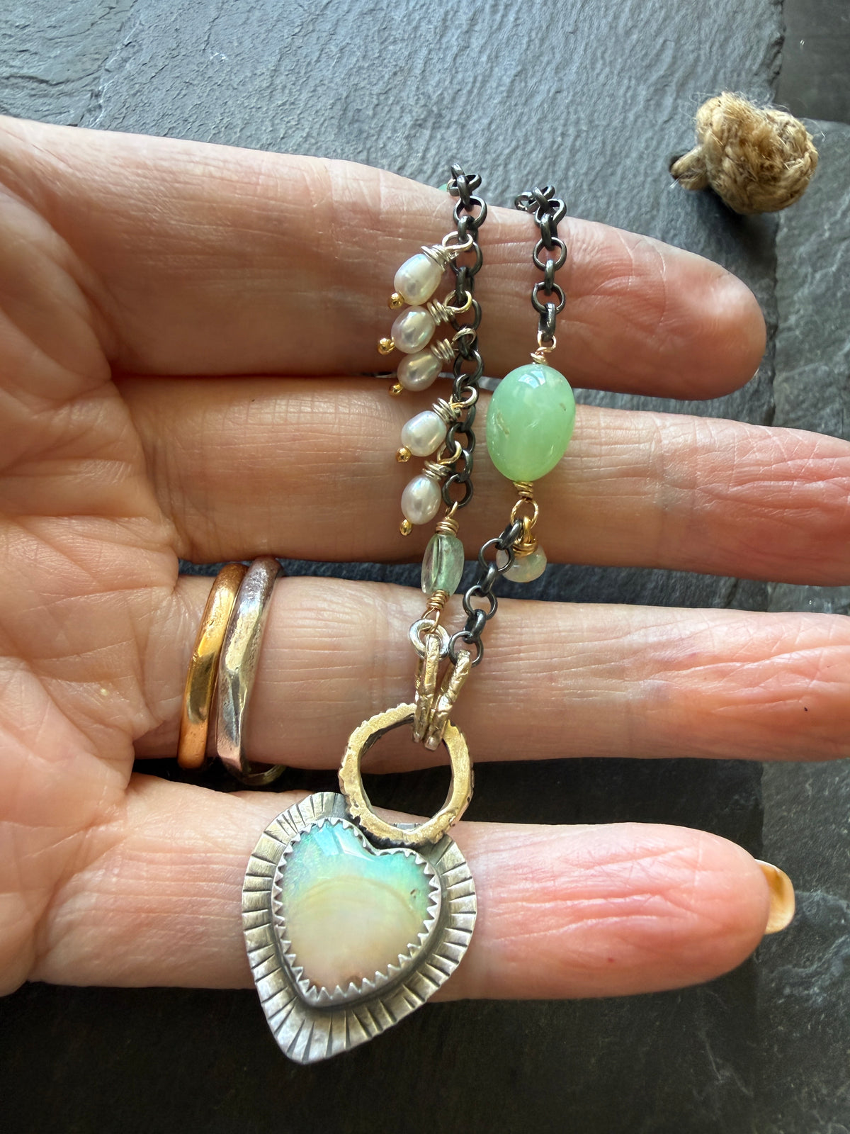Wire wrapped gemstones with a Boulder Opal Heart