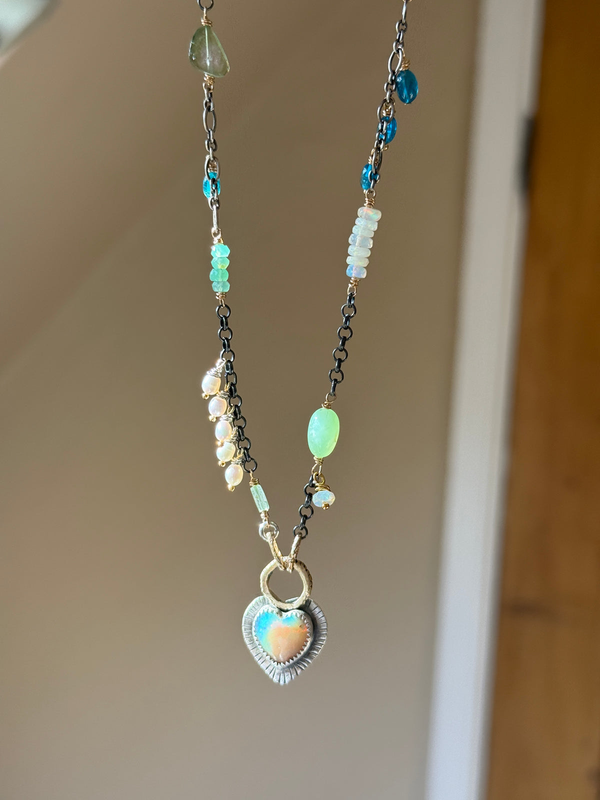Wire wrapped gemstones with a Boulder Opal Heart