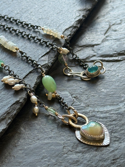 Wire wrapped gemstones with a Boulder Opal Heart